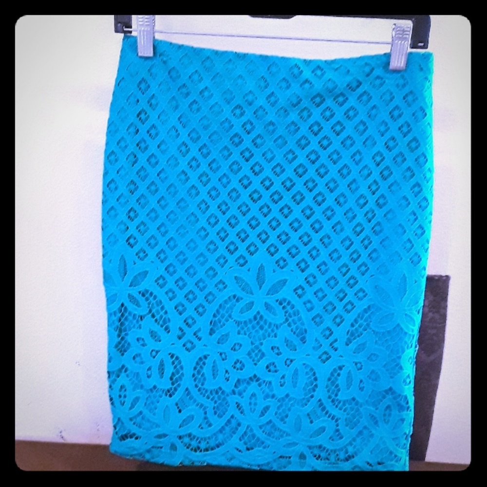 Teal green skirt with crochet lace style